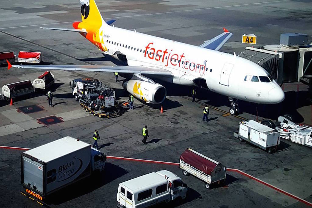A Fastjet aircraft parked on the tarmac. 
