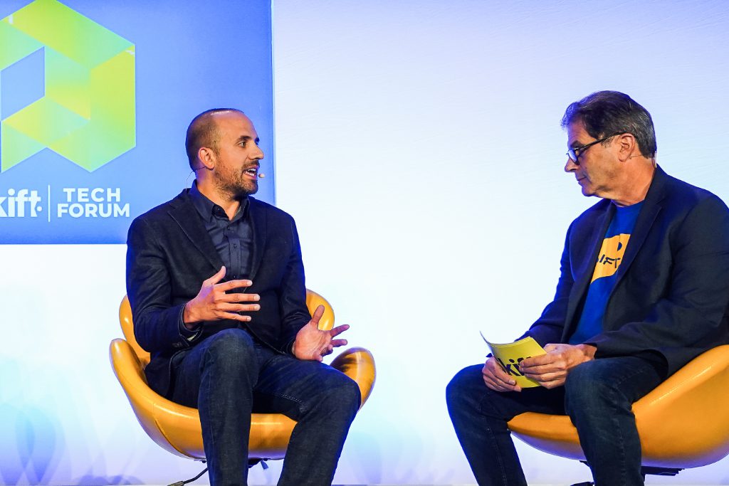 Eric Breon Vacasa CEO at Skift Tech Forum 2019 speaking with Dennis Schaal