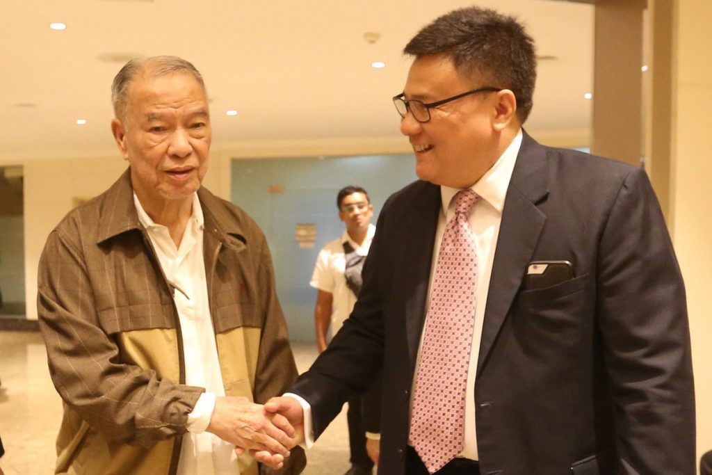 PAL chairman Lucio C. Tan (left) congratulates the airline’s new president and chief operating officer, Gilbert Santa Maria. 