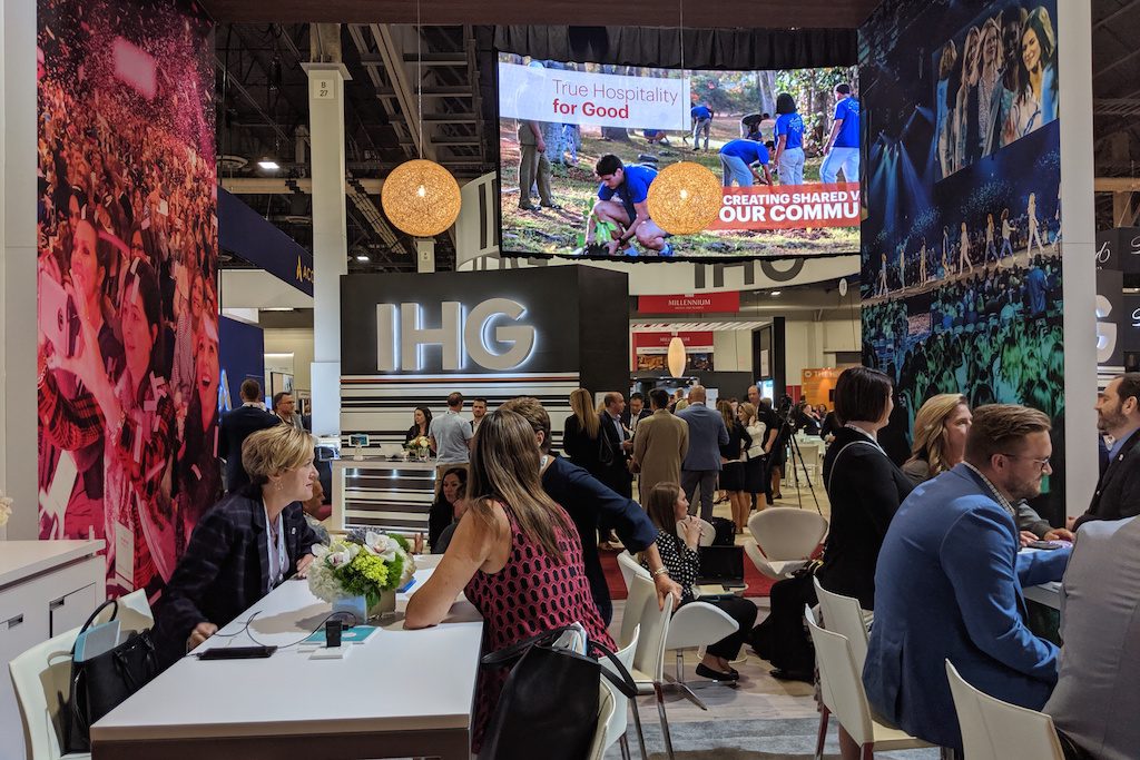 Event attendees meet at company booths. IMEX America 2019, Sands Expo, Las Vegas. Travel management companies are overdue for tech disruption.
