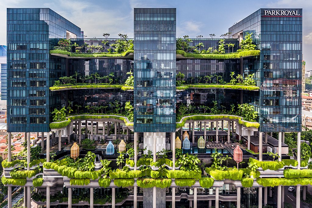 The PARKROYAL on Pickering in Singapore is an ideal example of biophilic design in practice, utilizing natural materials, curves, and greenery throughout.