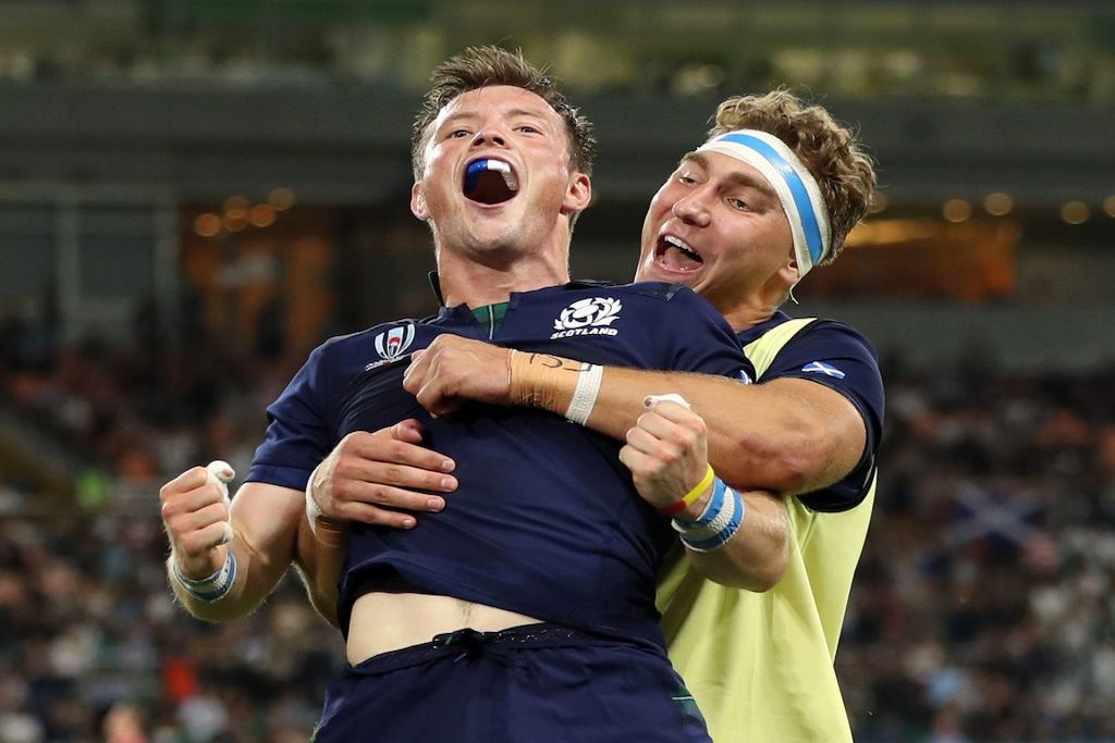 Scottish rugby players celebrate during a match at Japan's Rugby World Cup.