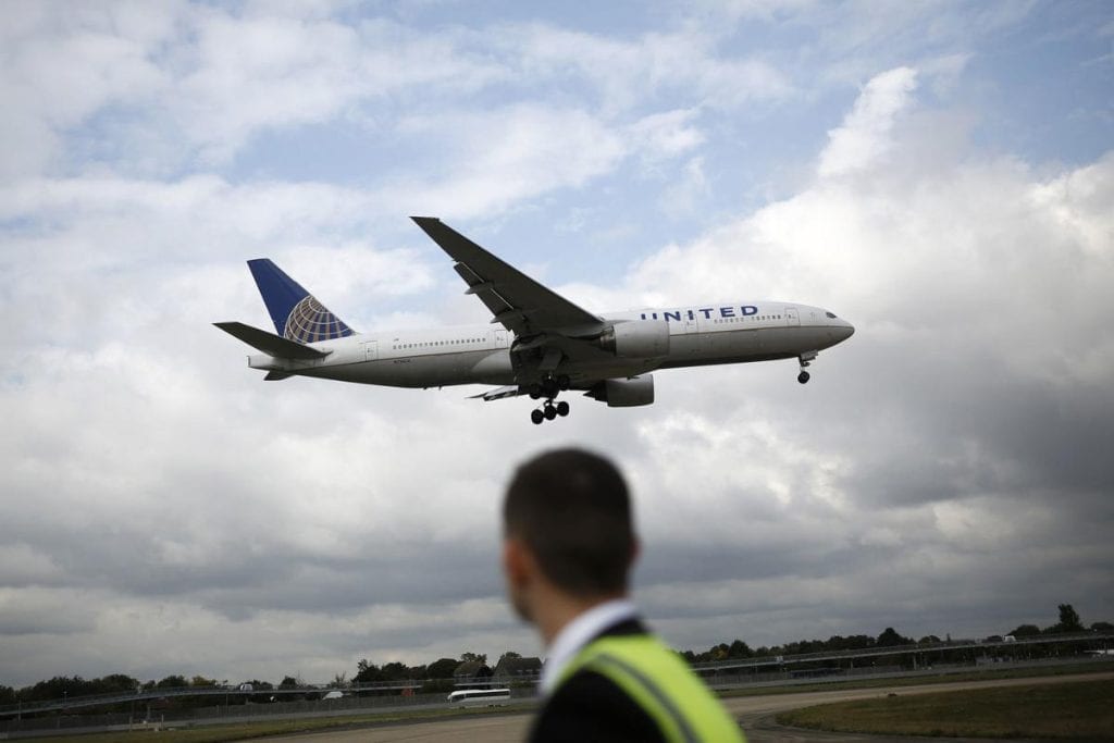 A United Airlines aircraft lands at O'Hare Airport in Chicago. United Airlines President Scott Kirby said he had no intentions to leave United for rival airline American Airlines, his former employer, in comments made Thursday.
