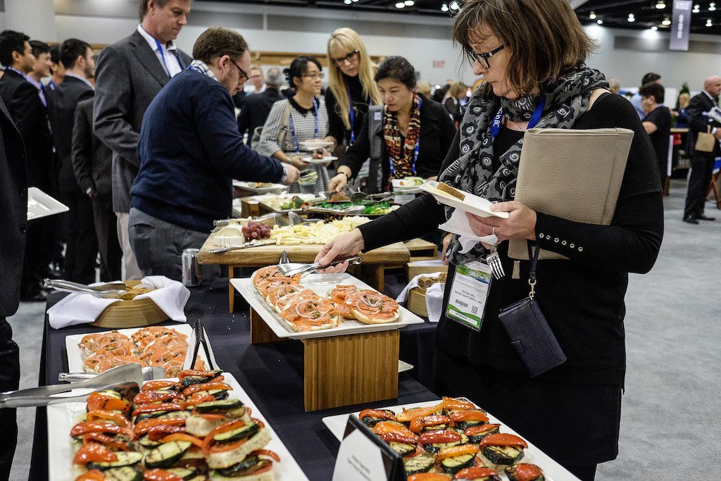 Conference attendees grab lunch at the hotel buffet. 