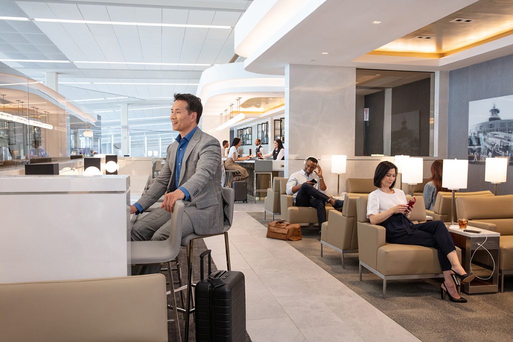 Some passengers at a United Airlines lounge at LaGuardia airport in New York City. Corporate travelers may see smoother handling of bookings they make directly if ARC's new CEO broadens the airline-owned company's scope.