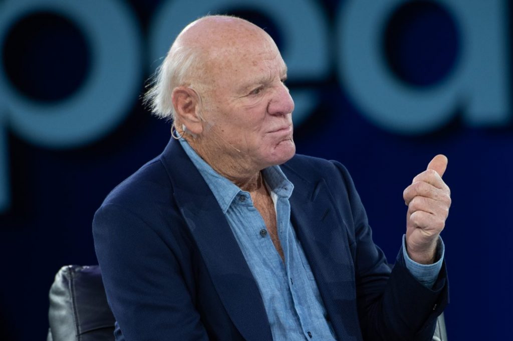 Expedia Group senior executive Barry Diller is searching for a CEO to replace Mark Okerstrom. Diller is shown November 14, 2019 at the company's partner conference in Las Vegas.