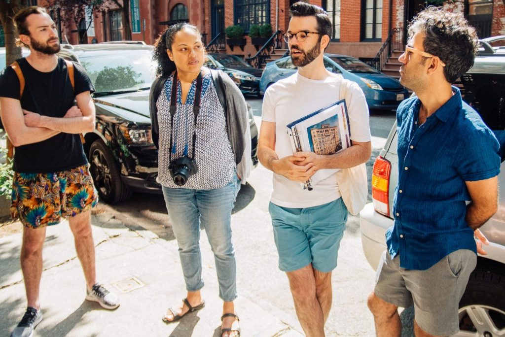 A file photo of an Airbnb tour in New York City. The company filed a lawsuit against the city, alleging that new restrictions in practice amount to a ban. Source: Airbnb