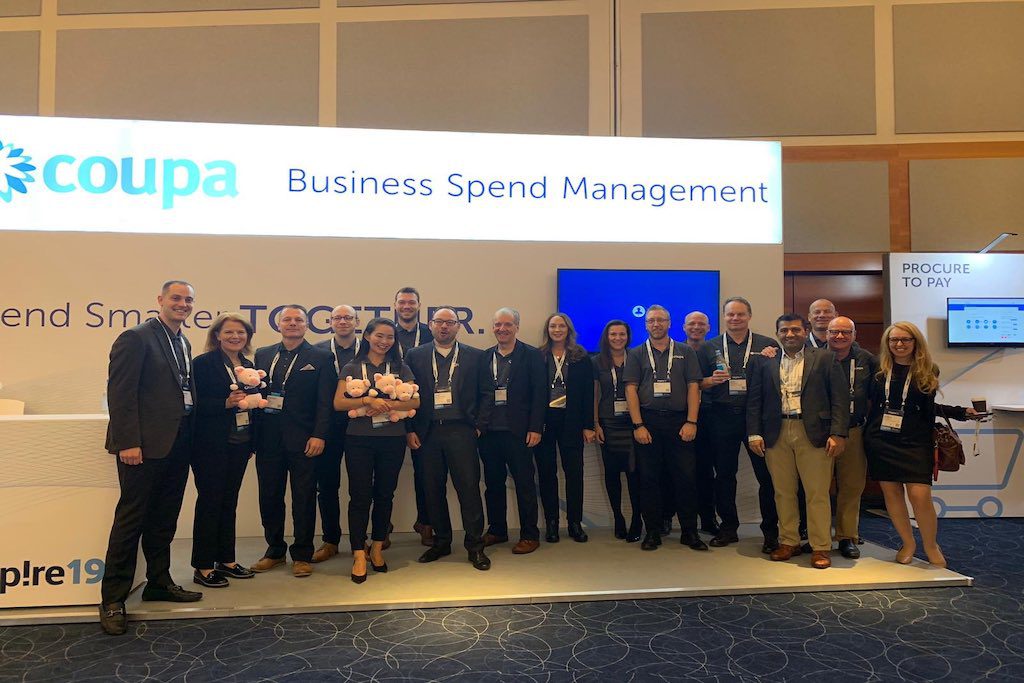 Coupa employees at a trade show. Coupa bought Yapta to take on SAP Concur.