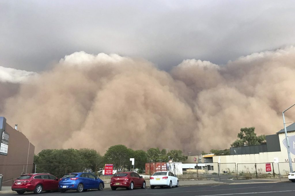 Dust storms, hail and flash floods have battered beleaguered Australian cities in recent days, including Canberra, pictured here. 