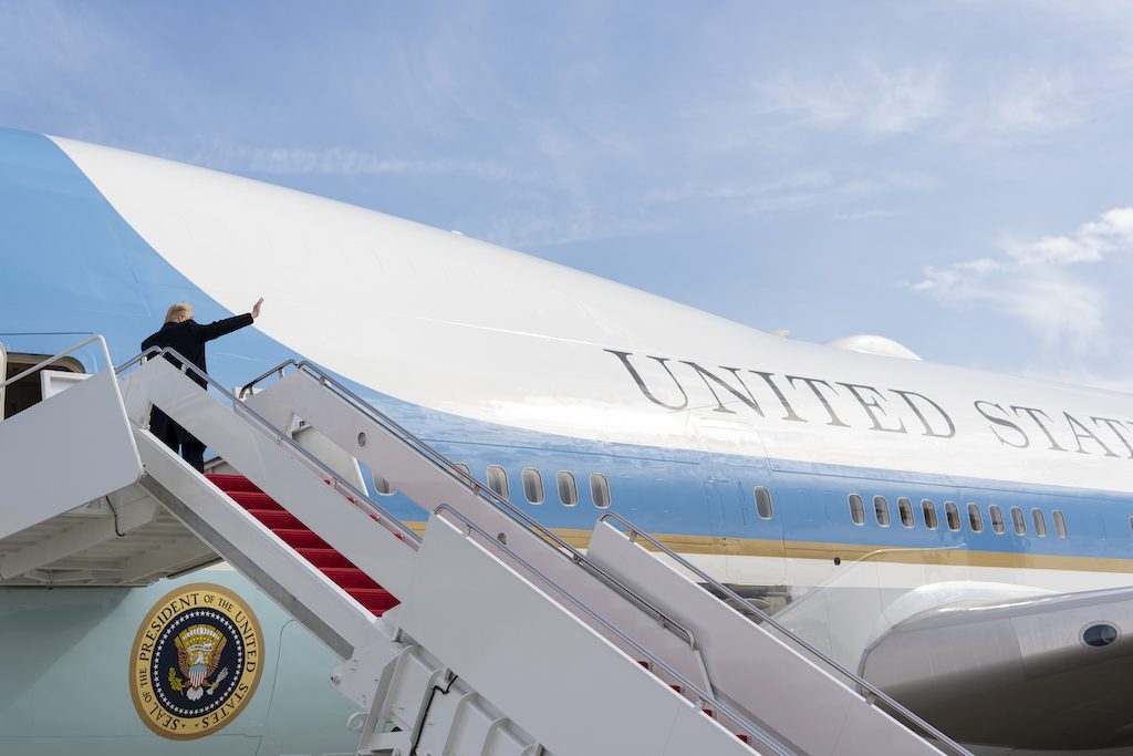 President Donald J. Trump waves as he boards Air Force One at Joint Base Andrews, Md., Tuesday, Feb. 18, 2020, to begin his trip to California and Nevada.