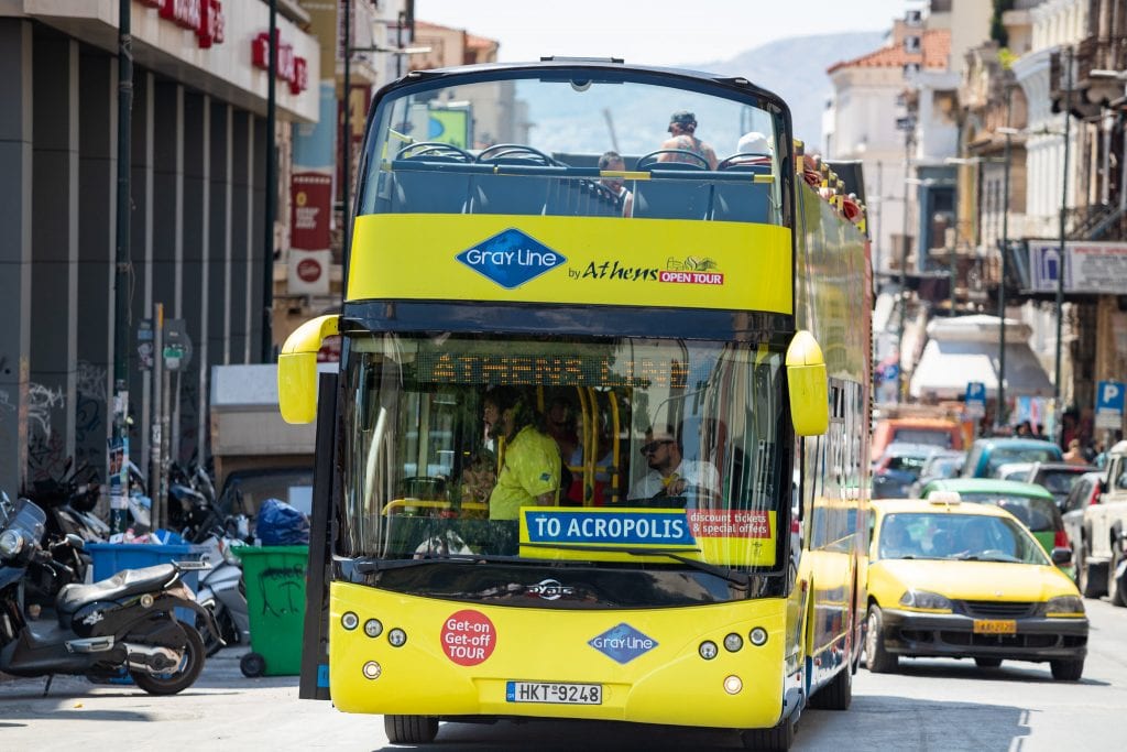 An Athens, Greece bus tour on July 15, 2018. Tripadvisor is raising prices on its tours and activities.