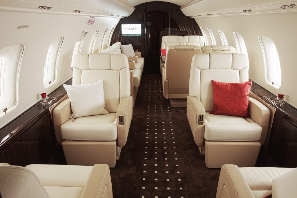 Aircraft interior of VistaJet’s Challenger 605 private jet.