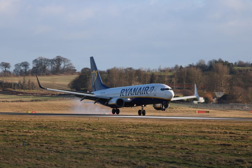 A Ryanair aircraft landing. The airline reported a sharp rise in third-quarter profit.