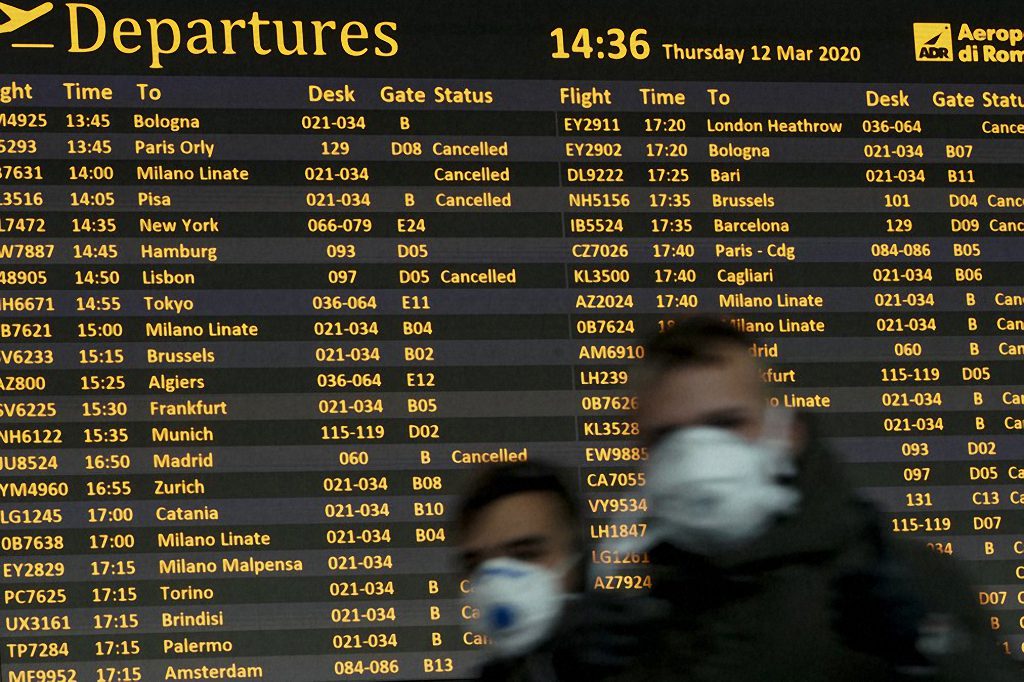The departures board at Rome Leonardo da Vinci International Airport.