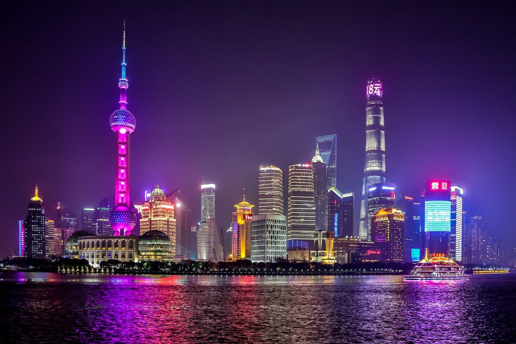 IHG isn't backing away from China despite a volatile recovery and scrutiny over a major real estate developer there (pictured: Shanghai).