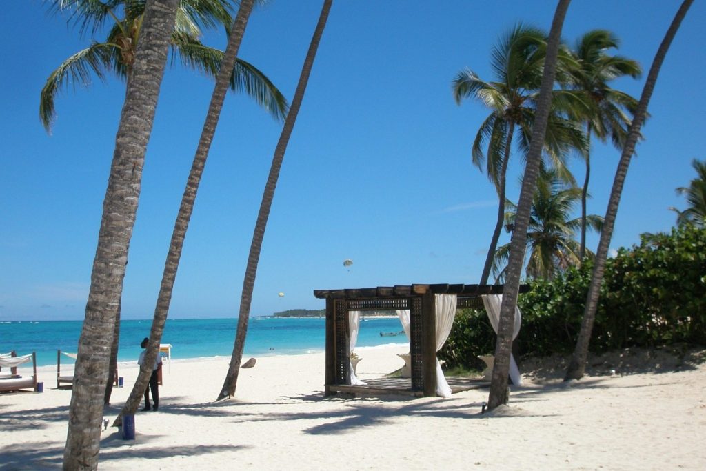 A vacant beach like this one in the Dominican Republic may be the new norm for some time. 