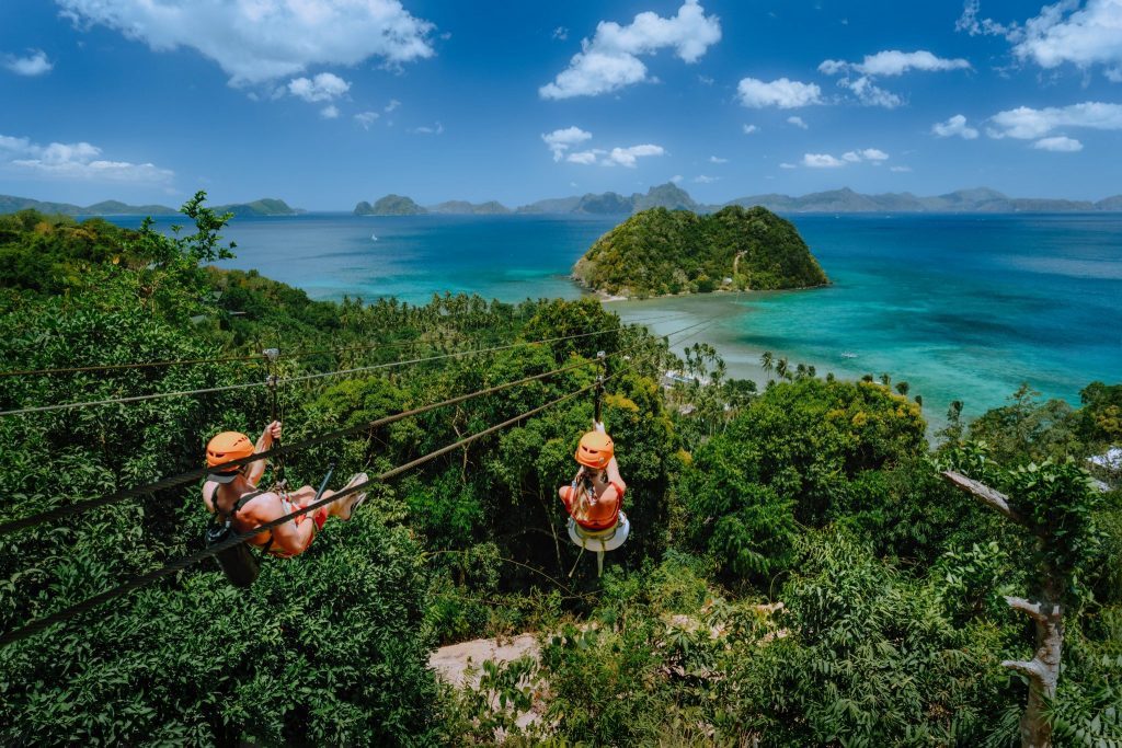 The coronavirus pandemic is forcing tour operators and attractions to heighten their health and sanitation protocols, like this zipline attraction from El Nido Resorts in Palawan in the Philippines . 