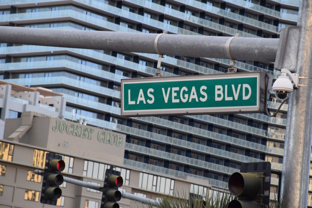A Las Vegas Blvd. sign with the Jockey Club Las Vegas in the background as seen on February 13, 2017. Many Las Vegas hotels are offering steep discounts as the city reopens after a coronavirus lockdown.