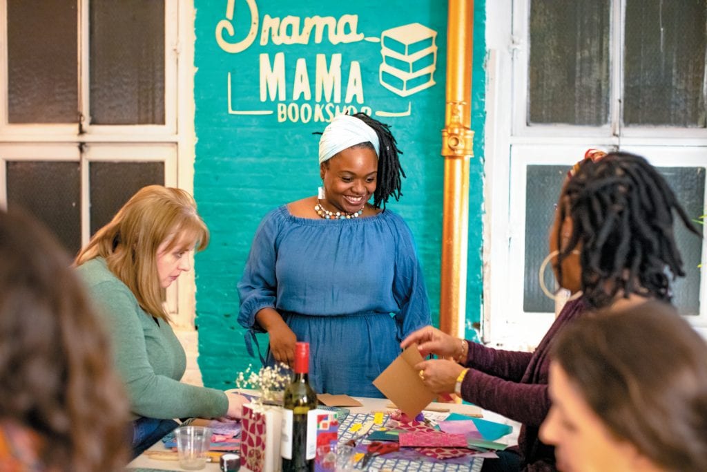 Alisa Brock, the owner of Drama MaMa Bookshop in Baltimore where she creates custom laser cut journals and hosts workshops to share her wisdom and binding techniques. Photo courtesy Visit Baltimore.