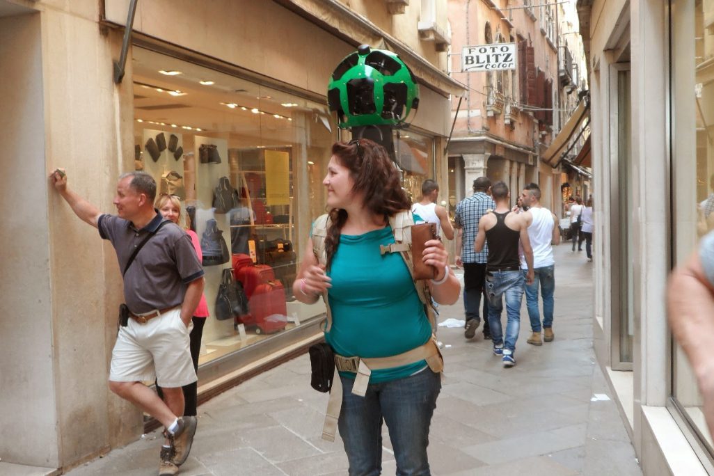 Google could potentially be forced to separate some of its businesses like Maps and search under antitrust proposals. Pictured, Valentina Frassi a program manager for Google Street View, on the move at a destination. 
