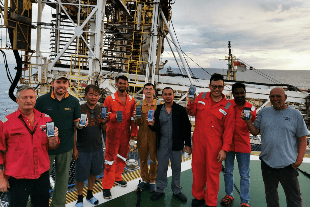 Happy travelers from Singapore's Energy Drilling Management, who are using International SOS's new ICC AOKpass  — an app that stores an individual's Covid-19 test result.