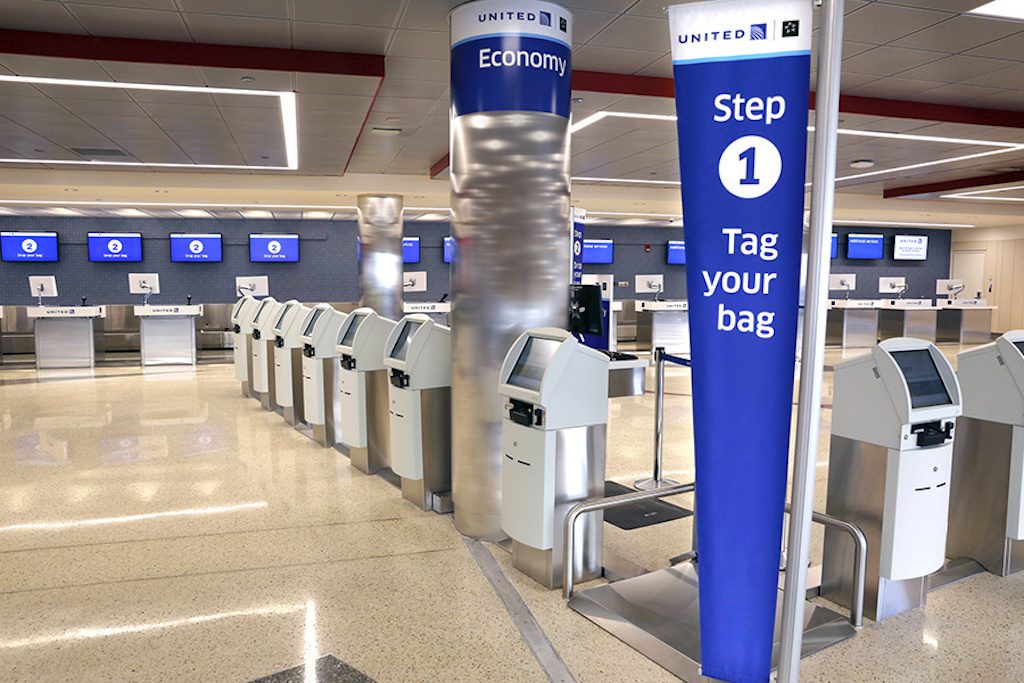 Several U.S. airlines report the recovery has slowed. Pictured is the United Airlines terminal lobby in Boston. 