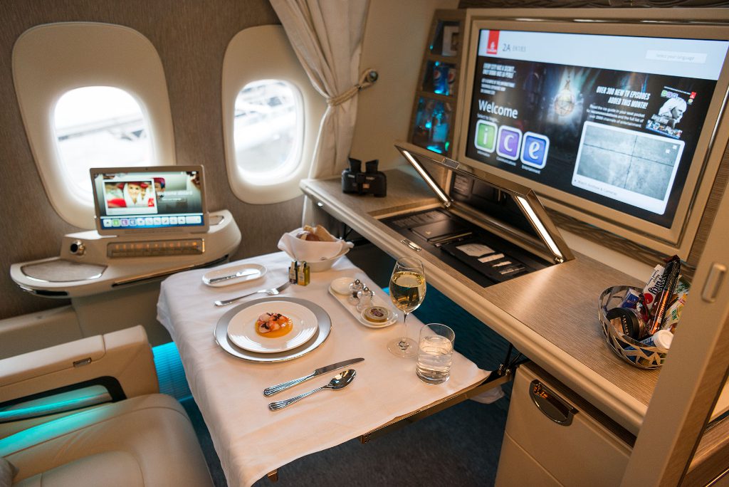 A view of the meal service in first class on an Emirates Boeing 777-300ER aircraft. Emirates is one of the largest customers of Sabre's travel tech services.