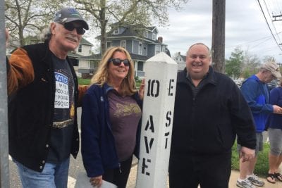 Original E Street Band drummer Vini Lopez, left, with tour guides Jean Mikle and Stan Goldstein at the corner of 10th Avenue and E Street in Belmar, New Jersey