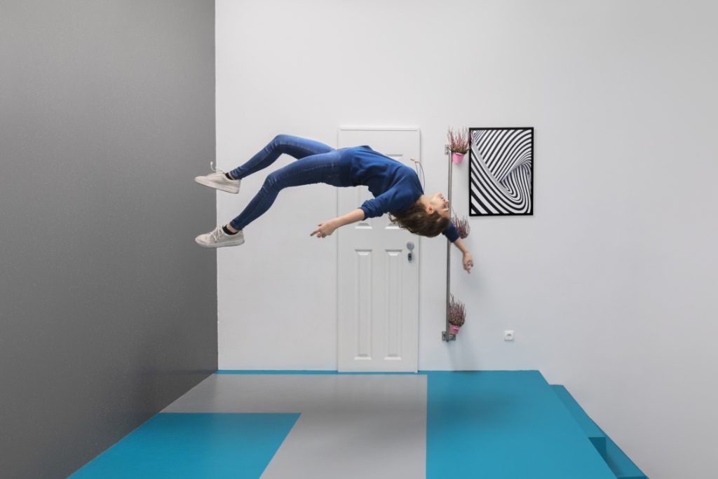 A visitor to the Museum der Illusionen in Vienna, Austria, plays an optical trick on the camera thanks to a cleverly designed room. The museum uses BookingKit's central booking and administration system. BookingKit has just raised additional funding.