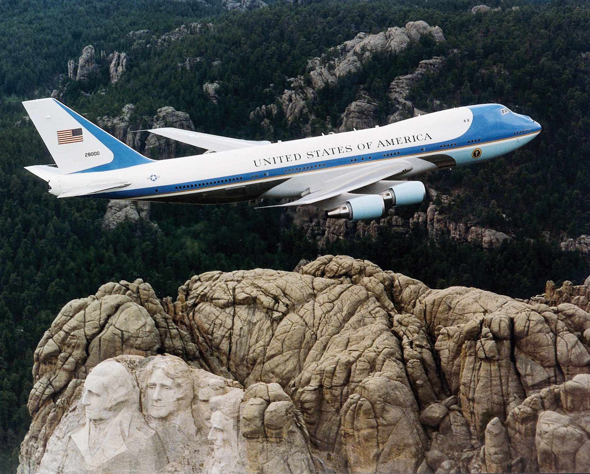 SAM 28000, one of the two VC-25As used as Air Force One, flying over Mount Rushmore in February 2001.