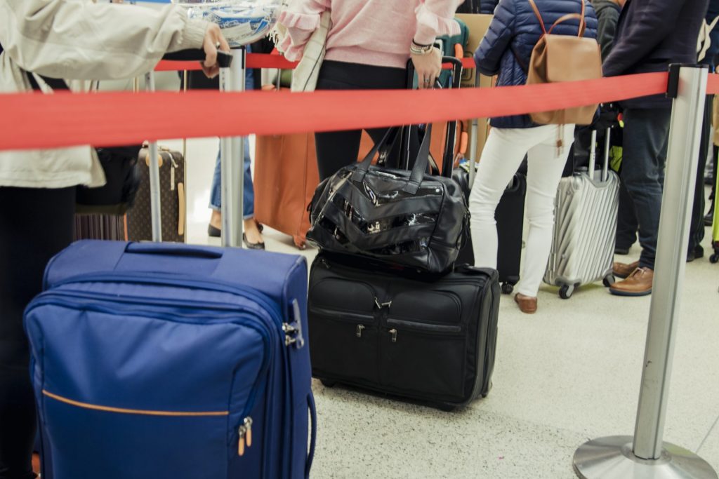 Crowds like these at U.S. airports were not uncommon in the days leading up to Thanksgiving, despite a resurgent cases of coronavirus.