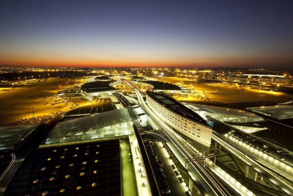 Paris's Charles de Gaulle Airport, as seen at night during busier times. The top bosses of Air France and Ryanair differed on competitiveness, fairness, and the value of testing at airports at Skift Aviation Forum.
