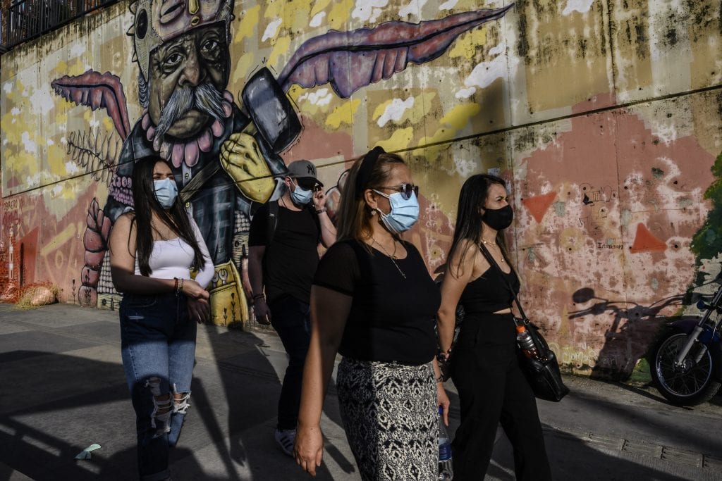 Tourists are pictured at the Comuna 13 neighborhood in Medellin, Colombia, as the the tourism sector reactivates amid the pandemic.