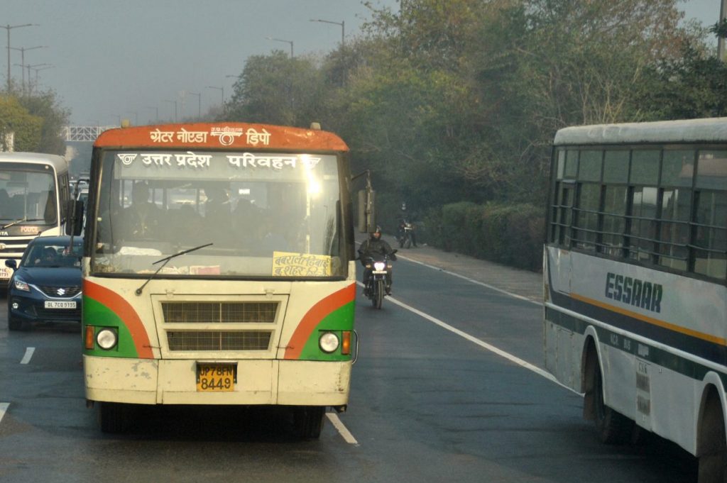 Bus trips are recovering in India. Pictured is bus traffic on a highway in India February 6, 2020. 