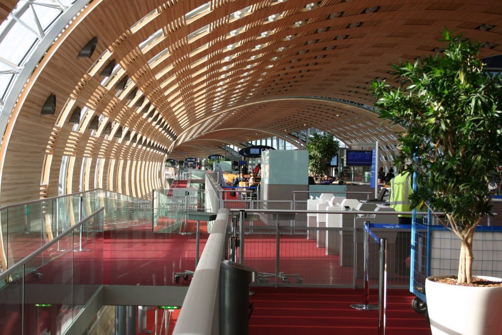 A ban on non-essential travel in France has greatly reduced air travel into the country, leaving airports like De Gaulle (pictured)  in Paris even more desolate. 