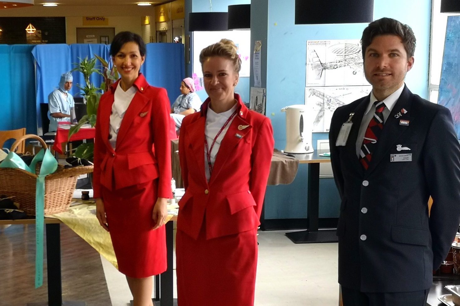 Virgin Atlantic's Lisa Holt (center) has joined other cabin crew to volunteer for UK charity Project Wingman, which supports the UK's National Health Service.