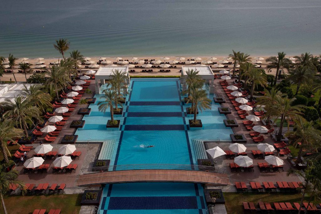 A view of the pool and beach at the Jumeirah Zabeel Saray resort in Dubai, UAE. Jumeirah is a customer of the newly merged Cendyn.