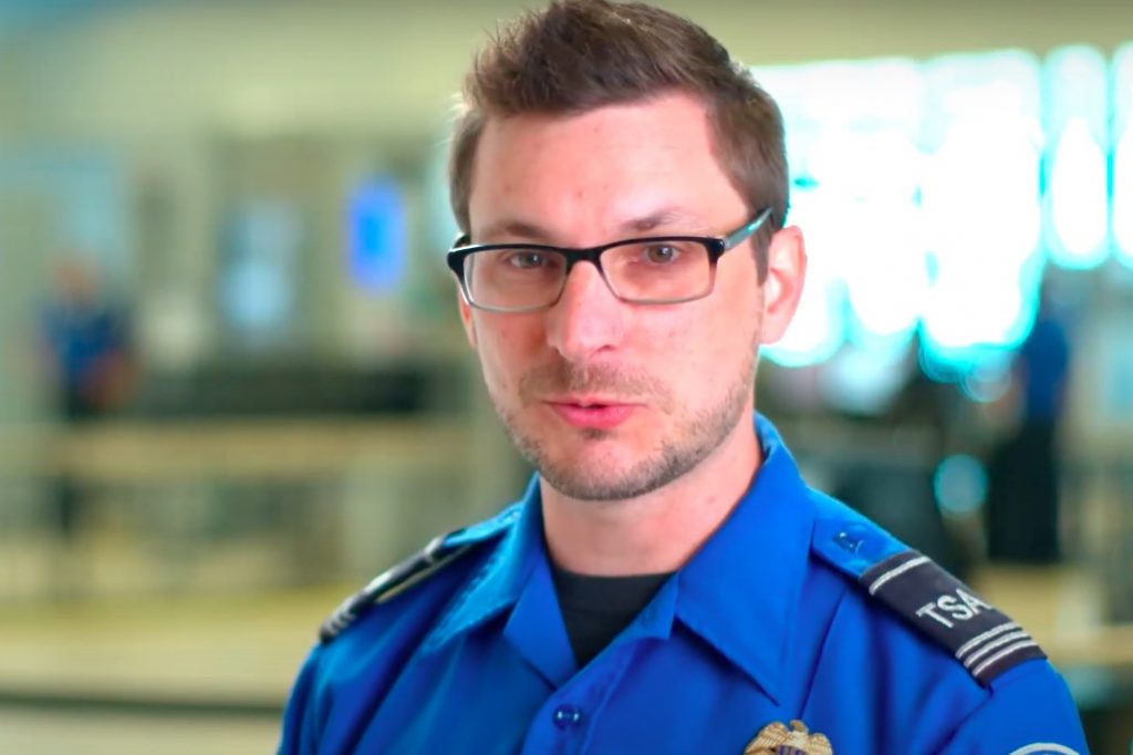 A TSA screener as seen in a recruitment video.
