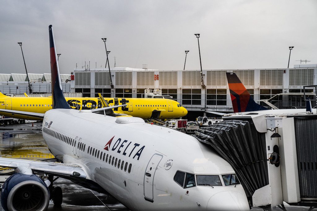 Delta and Spirit are among airlines reporting an uptick in bookings this spring. 
