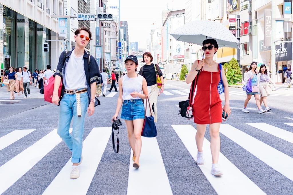 Chinese travelers in the upscale shopping district of Ginzo in Tokyo, Japan on July 18, 2018. Trip.com Group wants to generate advertising revenue through content creation. 