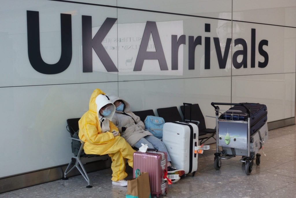 Some passengers arriving in the UK choose to wear protective clothing.