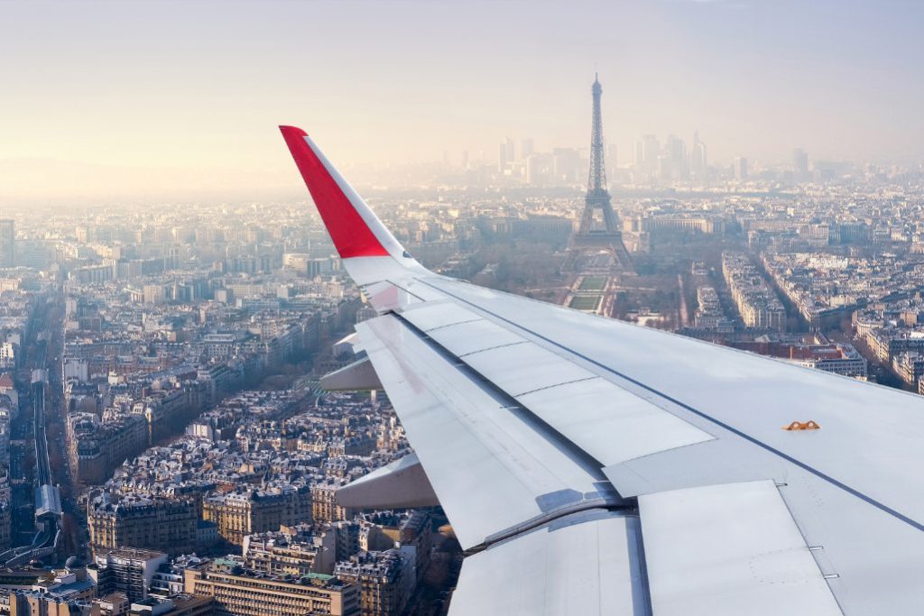 Paris Cityscape View from Airplane Window air france Eiffel tower source adobe