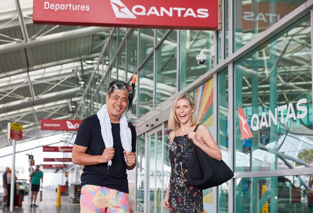 Passengers arriving at the airport wearing a little bit of everything in preparation for their Qantas mystery flight in Australia during the pandemic