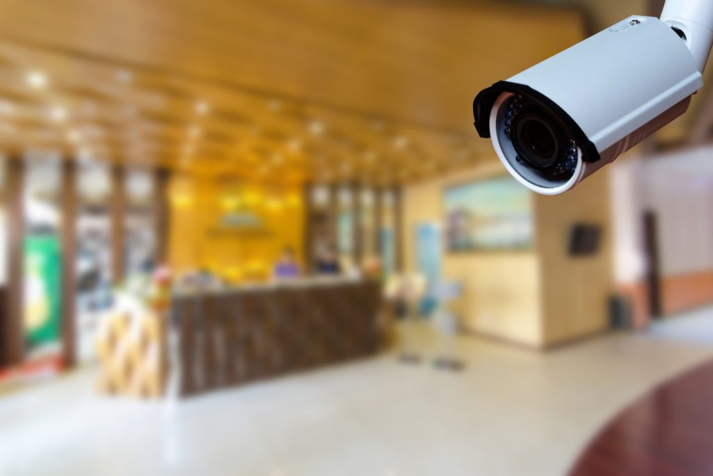 A camera at a hotel lobby. New voluntary guidance from the U.S. National Institute of Standards and Technology (NIST) tells hotels how to secure property management systems. 