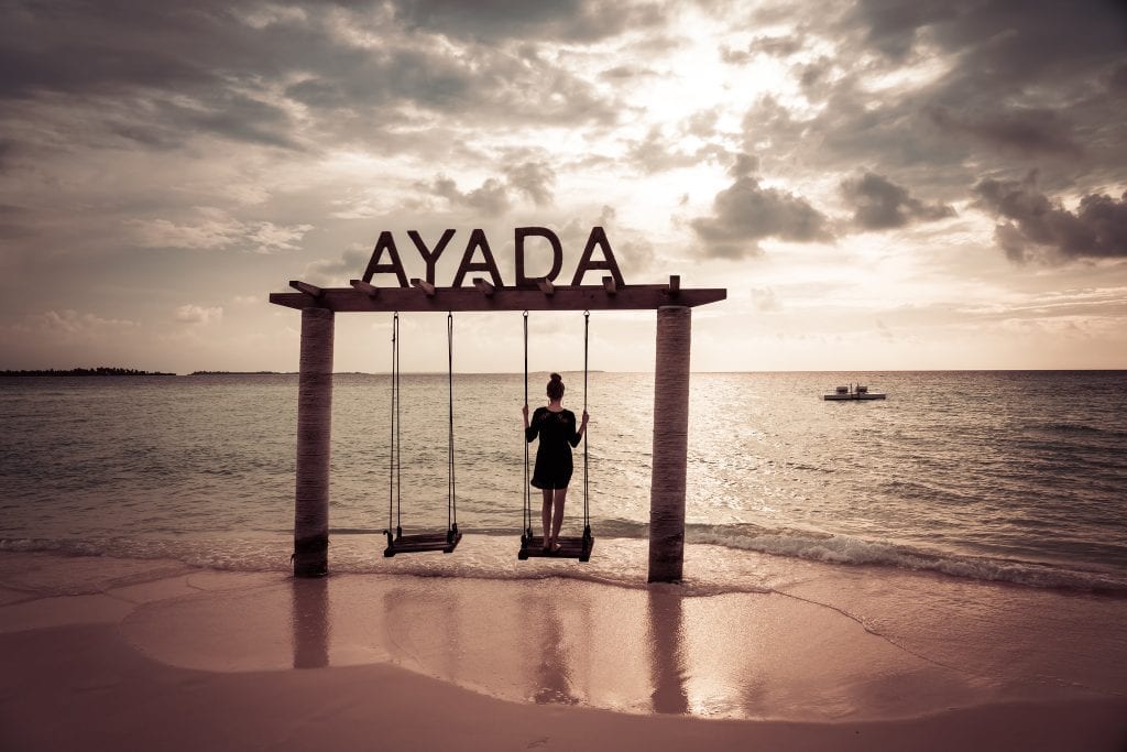 A young person on a swing at the Ayada resort in the Maldives on February 27, 2020. The archipelago is testing new tourism models with private developers. 
