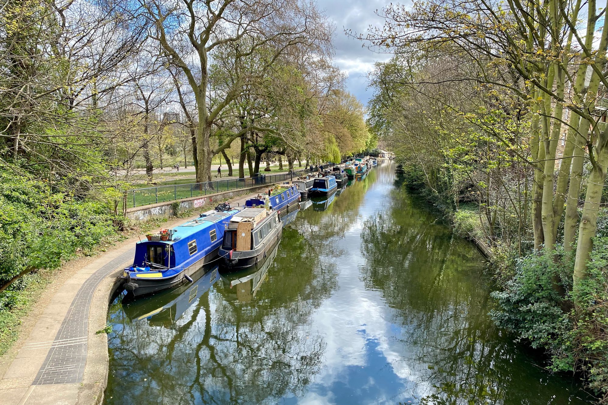 Boats on a canal in London's Victoria Park. The United States has eased some restrictions on travel to the United Kingdom and Israel. 