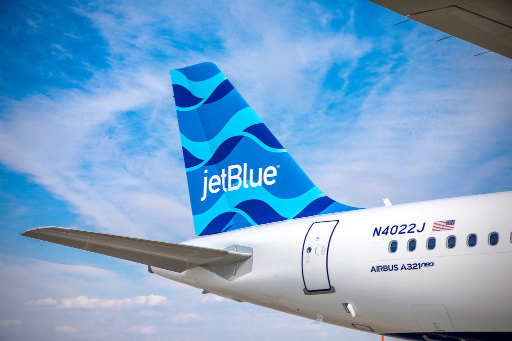 The tail of a JetBlue A321LR. The airlines flights are now being offered by Hopper. 