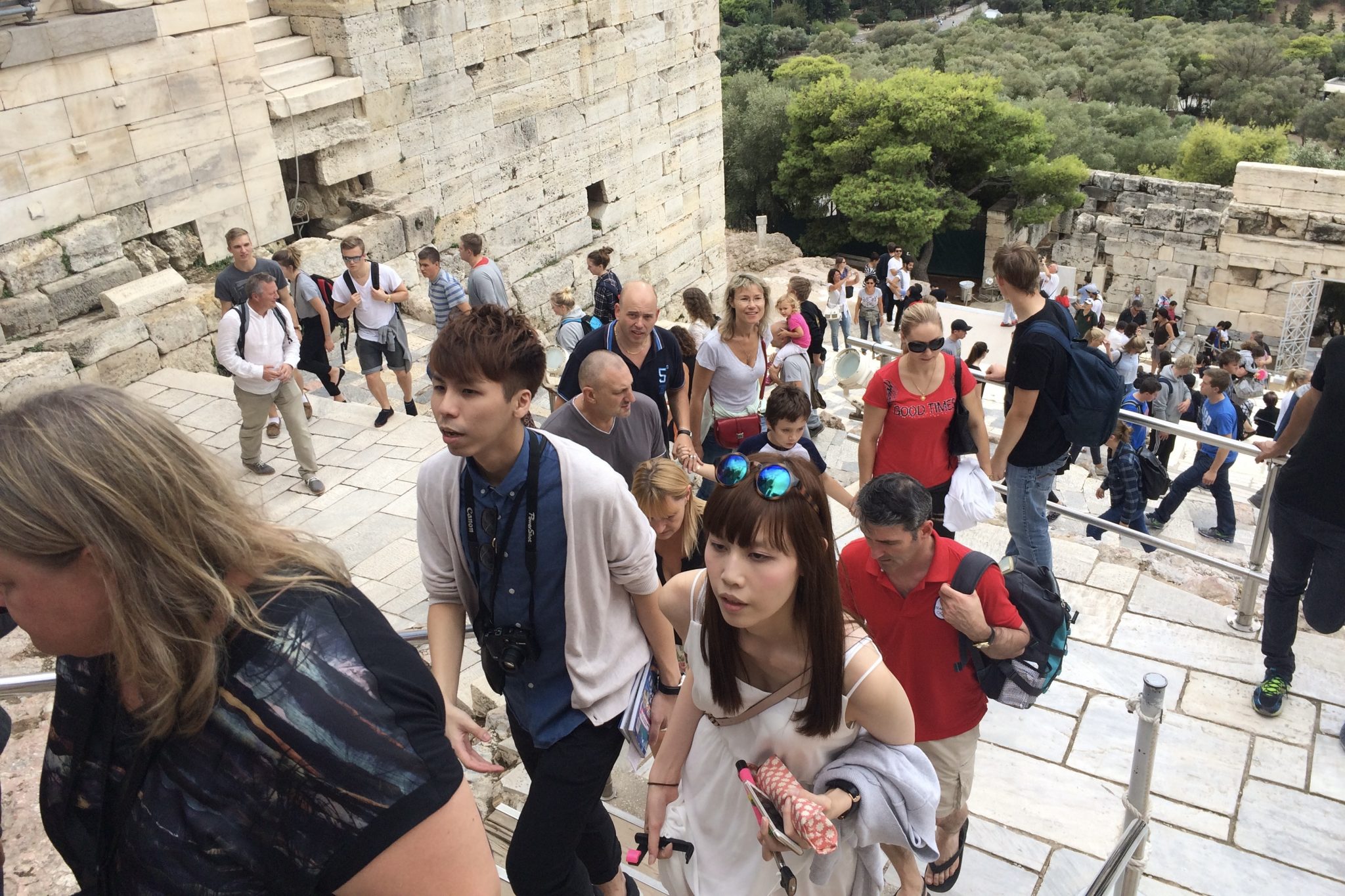 Tourists at the Acropolis in Athens, Greece. 