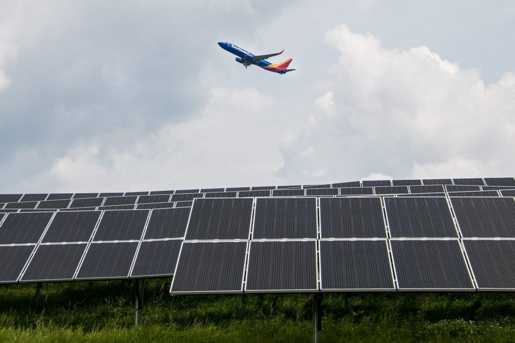 A Southwest plane flying over Pittsburgh airport microgrids