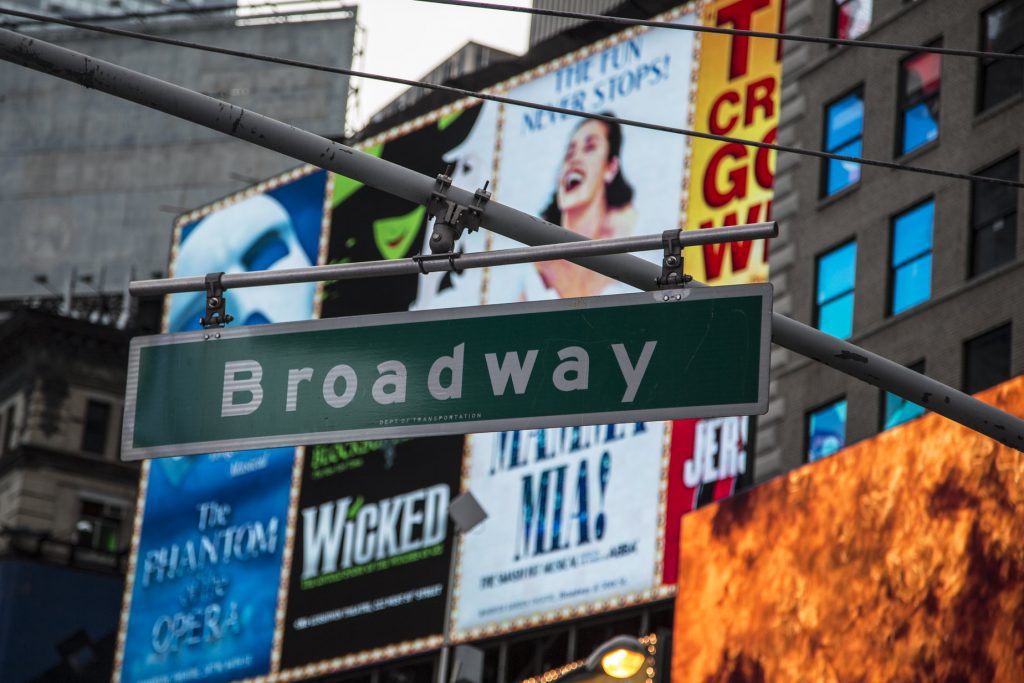 Broadway and New York City's theater district (seen here in happier days) is looking to draw tourists back to the Big Apple this fall when shows reopen with vaccination and mask requirements.